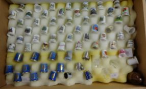 Collection modern bone china thimbles with display cabinet, also collection of modern bookmarks in