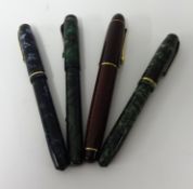 Three 14ct gold nib pens and another