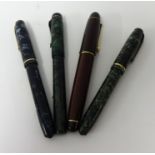Three 14ct gold nib pens and another