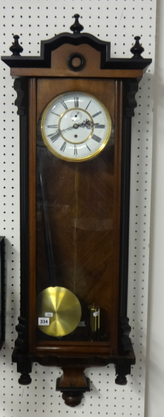 Vienna style single train wall clock, with pendulum and brass cased weight, approximately 116cm