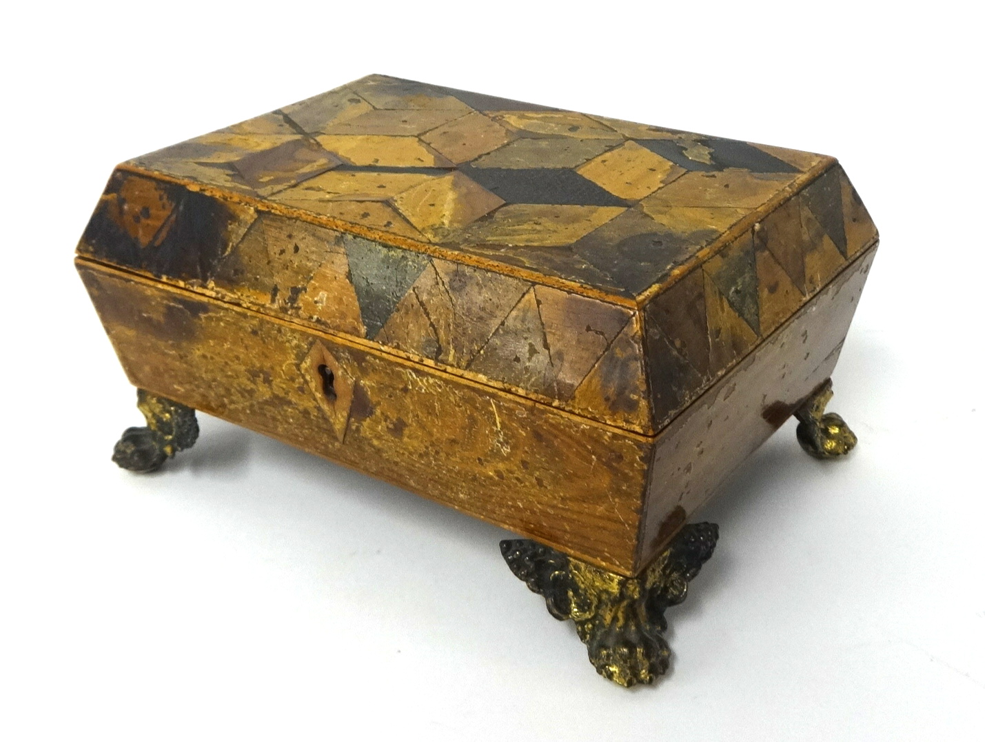 Small parquetry inlaid jewell box on gilt feet