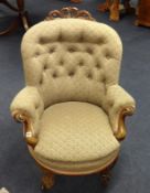 Victorian upholstered and carved walnut armchair