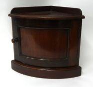 Small mahogany corner cupboard, bow fronted, 37cm high