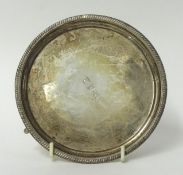 A silver presentation salver with inscription dated 1936 and gadrooned edge, 28 oz, EB for Edward