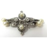 Antique diamond and pearl brooch set in white metal with old cut diamonds, 4.50cm x 2cm