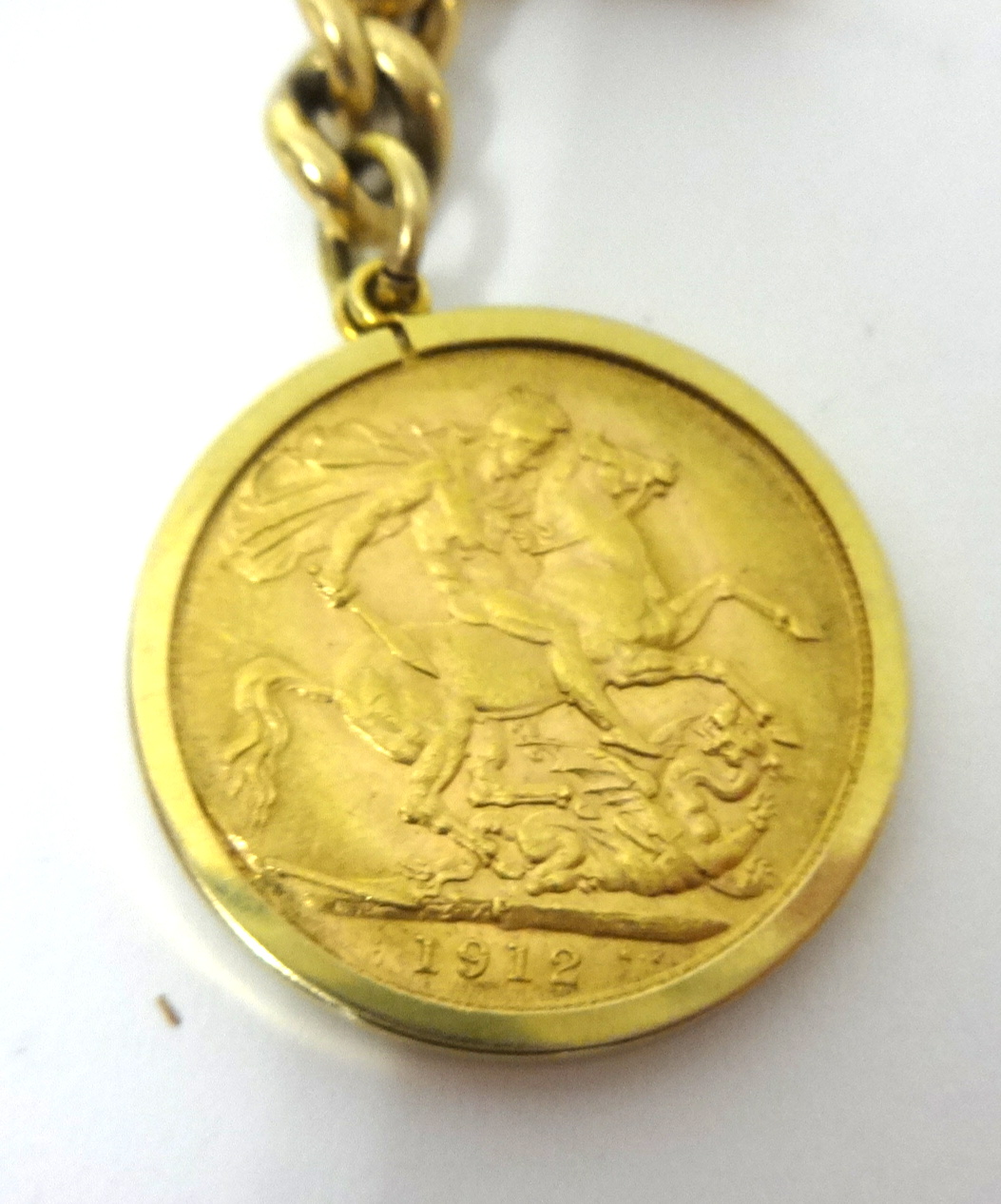 18ct gold watch chain with T bar mounted with a George V gold sovereign, approximately 46cm long, - Image 3 of 3