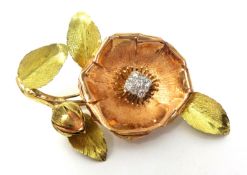 Bi colour 9ct gold flower brooch set with nine old cut diamonds, PP Ltd , 11.1g