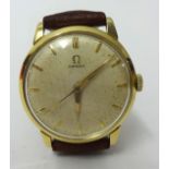 Gents 18ct yellow gold round Omega mechanical manual wind watch oyster coloured dial depicting baton