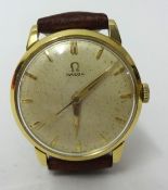 Gents 18ct yellow gold round Omega mechanical manual wind watch oyster coloured dial depicting baton