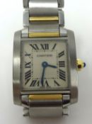 Lady's bi metal Cartier tank franchise quartz watch with cream coloured dial with roman numerals