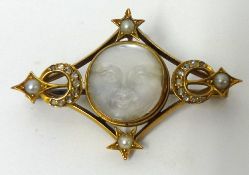 Antique 15ct gold four pointed diamond moonstone and pearl brooch with opaque carved moon face, no