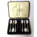 Set of six silver spoons and tongs, 2.75oz , in fitted case