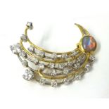 An opal and diamond spray brooch in 18ct gold and platinum, approximately 35mm wide