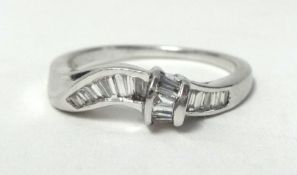 18ct white gold ring set with baguette cut diamonds, size N