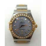 Lady's steel and rose gold Omega Constellation quartz watch with mother of pearl dial with diamond