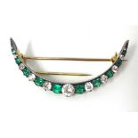 Antique emerald and diamond crescent brooch, approximately 4.5cm wide