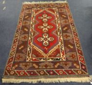 Eastern rug, approximately 182cm x 117cm