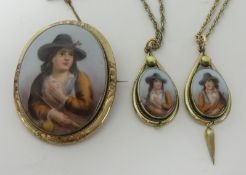 Three piece necklace and brooch set with porcelain portraits set in yellow metal