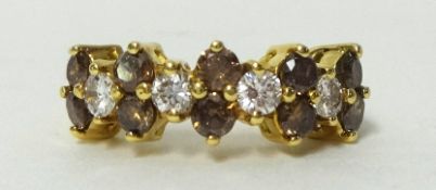 Two row diamond ring comprising two rows of cognac coloured diamonds interspersed with four rows