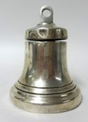 A silver inkwell in form of a ships bell inscribed 'RMS Queen Mary', 14cm (previously awarded to
