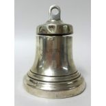 A silver inkwell in form of a ships bell inscribed 'RMS Queen Mary', 14cm (previously awarded to