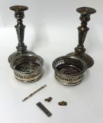Pair Elkington EP candlesticks, pair silver plated small bottle coasters, silver swizle stick, tie
