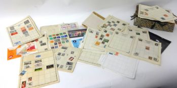 A collection of various World Stamps in albums and stock books, also interesting First Days Covers