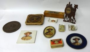 Mixed lot of twelve objects including plaster B-P plaque, Boy Scouts pencil case, paperweights,