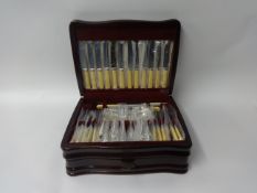 The Viners Table Top Collection of silver plated Sheffield cutlery in mahogany effect cabinet