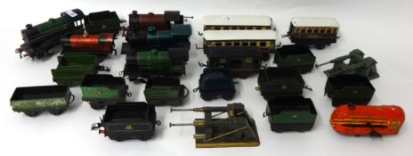 A collection of approx 25 Hornby and other tinplate and clock work O gauge engines, also some