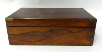 A 19th century rosewood and brass mounted writing slope fitted with two inkwells, 40cm wide