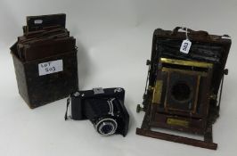 A Victorian plate rosewood camera, by Baker and Rouse (poor condition)