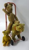 Push along soft toy bear with two other teddy bears