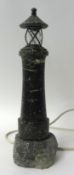 A marble lighthouse with wired fitting and lamp, 35cm