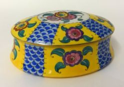 A Limoge porcelain box and cover, 5cm high