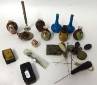 A collection of interesting objects including miniature Stanhope binoculars, hat pins etc (