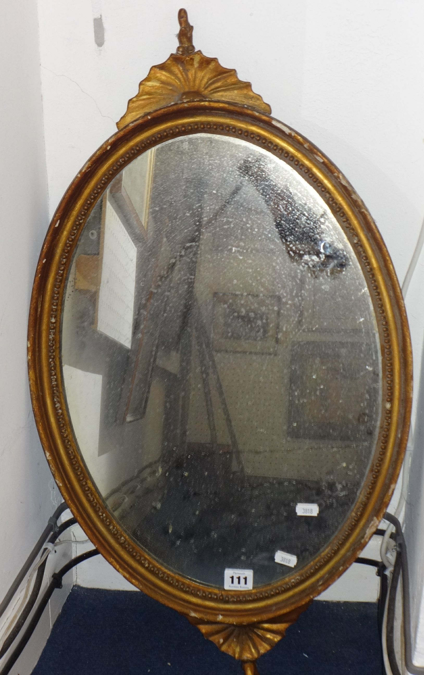 A 19th century gilt framed oval wall mirror, 79cm high