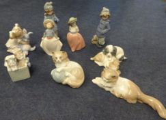 Four Nao Porcelain figures, boxed