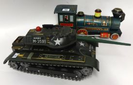 A Japanese tinplate tank and also a similar loco