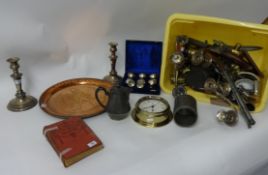 Mixed collection of metalwares including Indian brass, Quartz ships clock, old gas mask, Johnnie