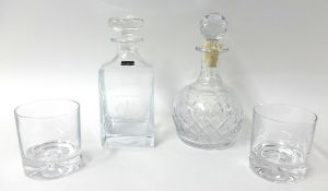 A Dartington glass decanter, boxed and two glasses t/w another decanter, tallest 25cm