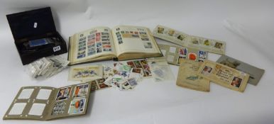 A collection of various general coins, Strand stamp album and cigarette cards, including boxed