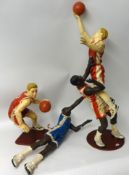 Three large modern basket ball figures, 95cm tall