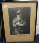 Signed B-P photo in early Scout uniform wearing Silver Wolf and Gillwell beads, framed