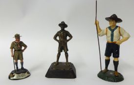 Three figures including B-P as Chief Scout painted pewter, early Boy Scout holding staff in lead,