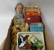 Various items including composition doll, old teddy bear, children's annuals, small Lesney diecast