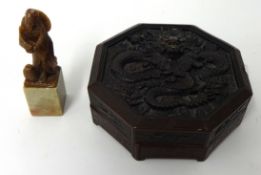 A 20th century carved box containing wax for seals together with seal