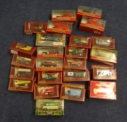 A collection of Matchbox Models of Yesteryear, mainly delivery trucks (26)