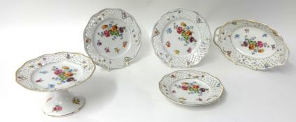 A five piece Dresden porcelain desert service decorated bright flowers with pierced borders (5)