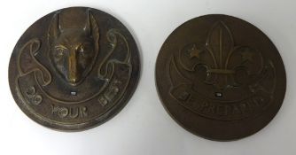 Two heavy bronze plaques Boy Scout and Wolf Cub badges